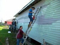 Students and school staff volunteering in the Lower 9th Ward.