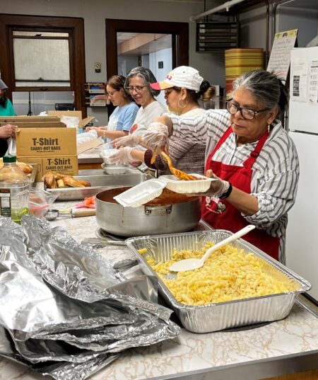 Photo of meal assembly line at Church of the City, New London.