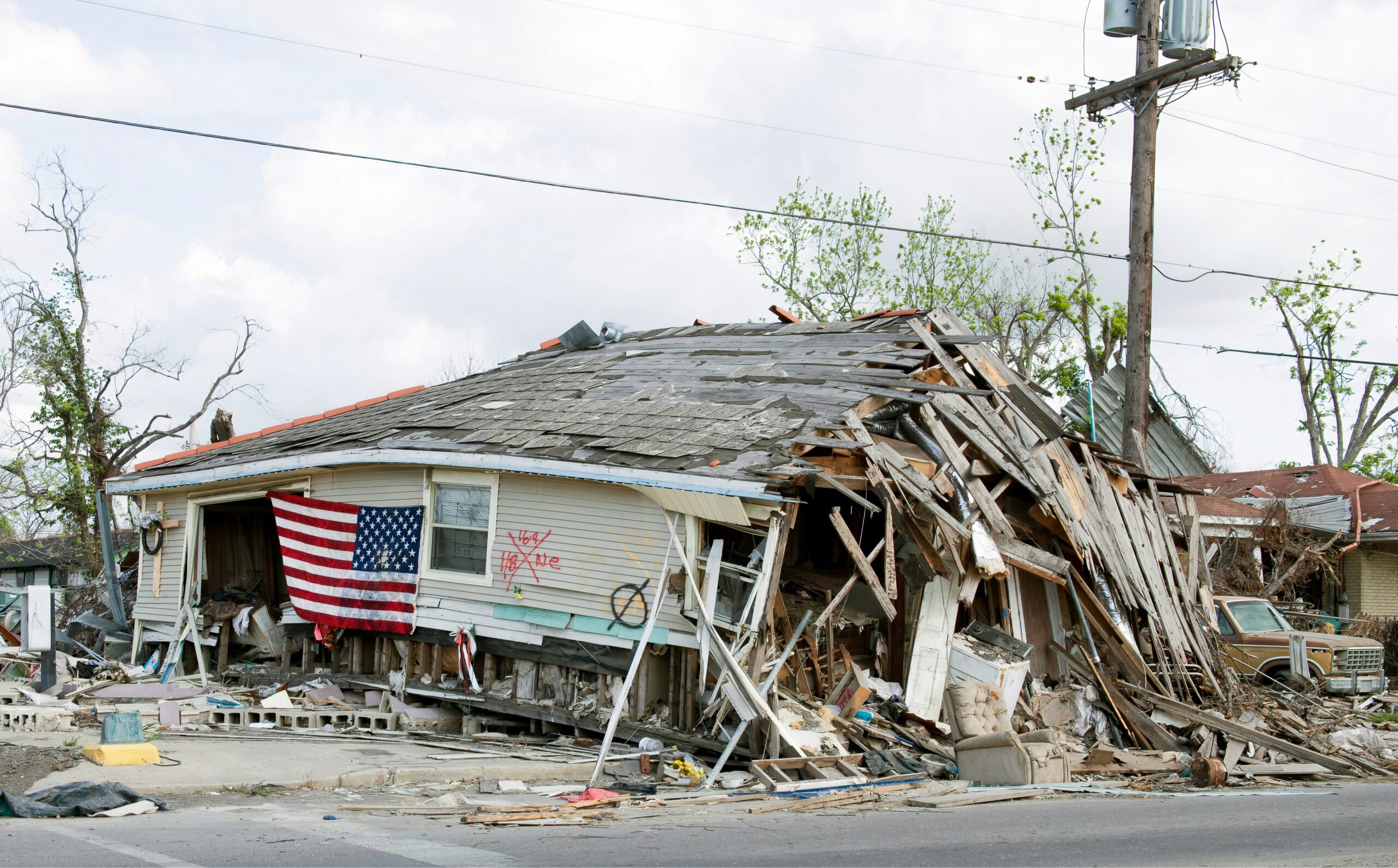 Photo of destroyed New Orleans residence after Hurricane Katrina in 2005